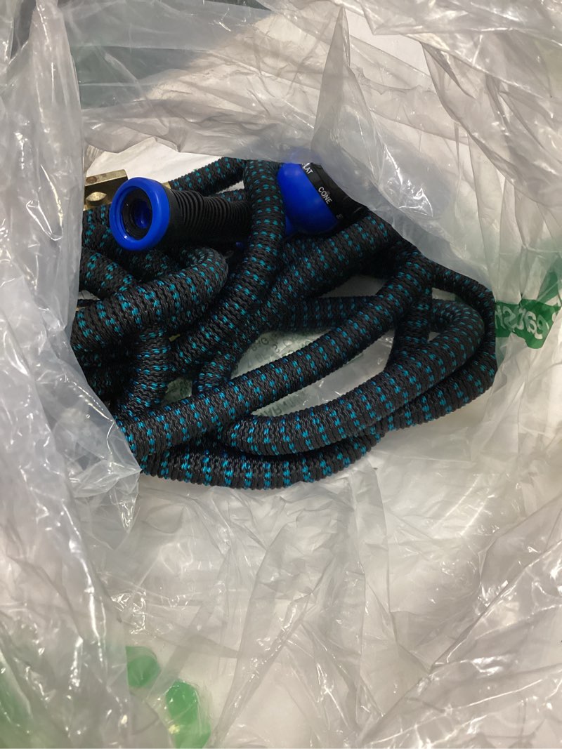 Condition photo showing As Is for flexi hose expandable garden hose with 8 function nozzle, 50ft - lightweight retractable garden hose, water hose - no-kink flexibility, 3/4 inch solid brass fittings and double latex core