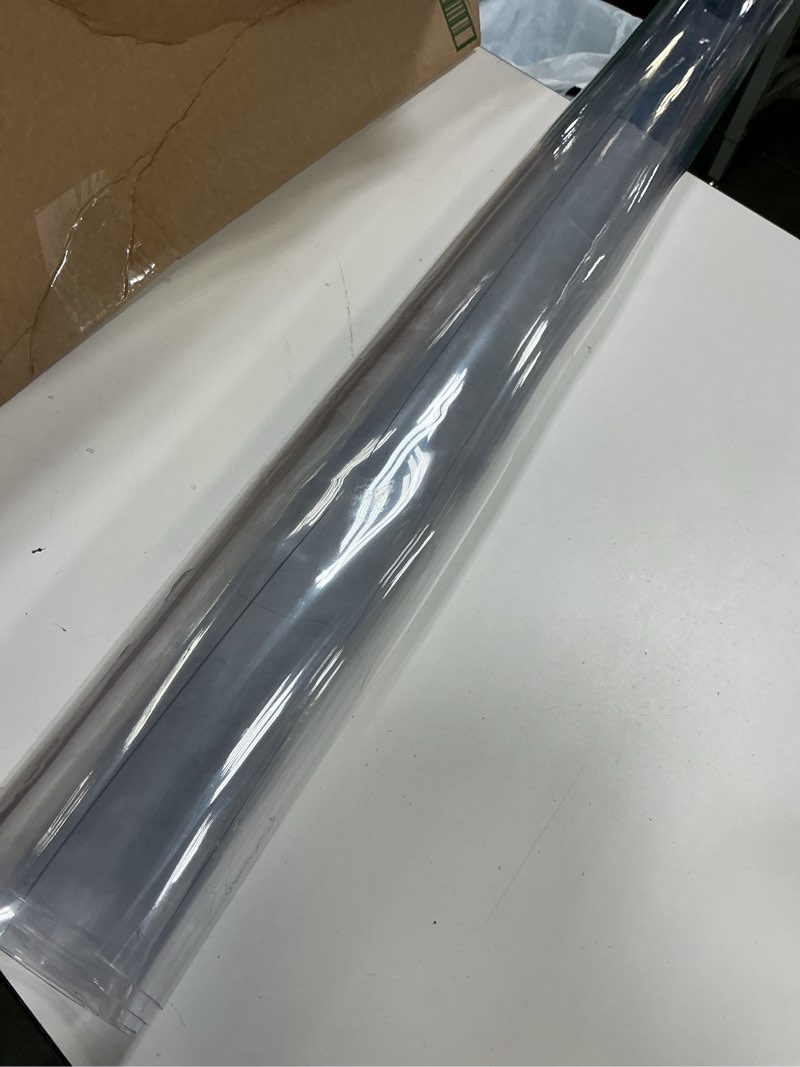 Condition photo showing As Is for 24 x 48 inch clear table cover protector, 2mm thick clear table protector for dining room table, plastic table cover, waterproof table pad for kitchen, office clear 2mm 24" x 48"