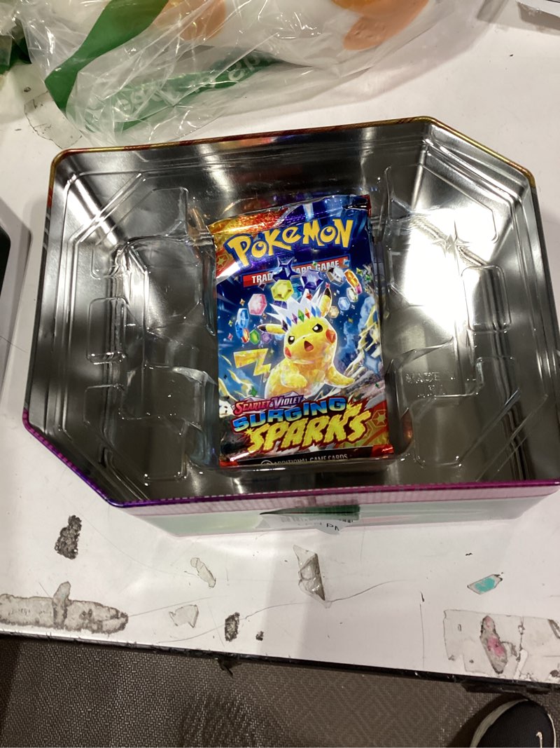 Condition photo showing As Is for similiar product not like stock photopokémon tcg: mega charizard and tin