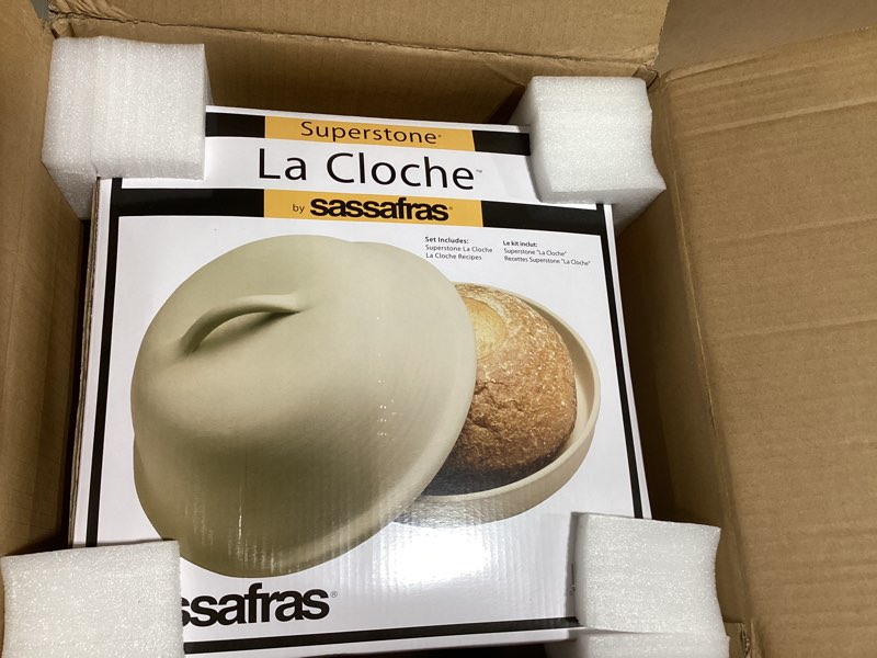 Condition photo showing New/Like New for Sassafras Superstone Stoneware La Cloche Bread Baker, Unglazed, Baking Stone for Bread, Capacity 5QT 12”D x7”H with handle, Withstands Temperature 500-2100 Fahrenheit