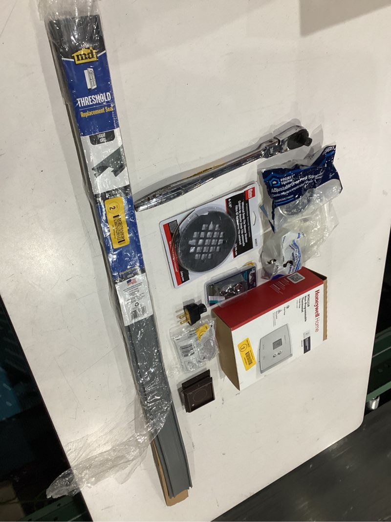 Condition photo showing As Is for assorted home improvement lot (small tools, screw, home accessories, etc.)