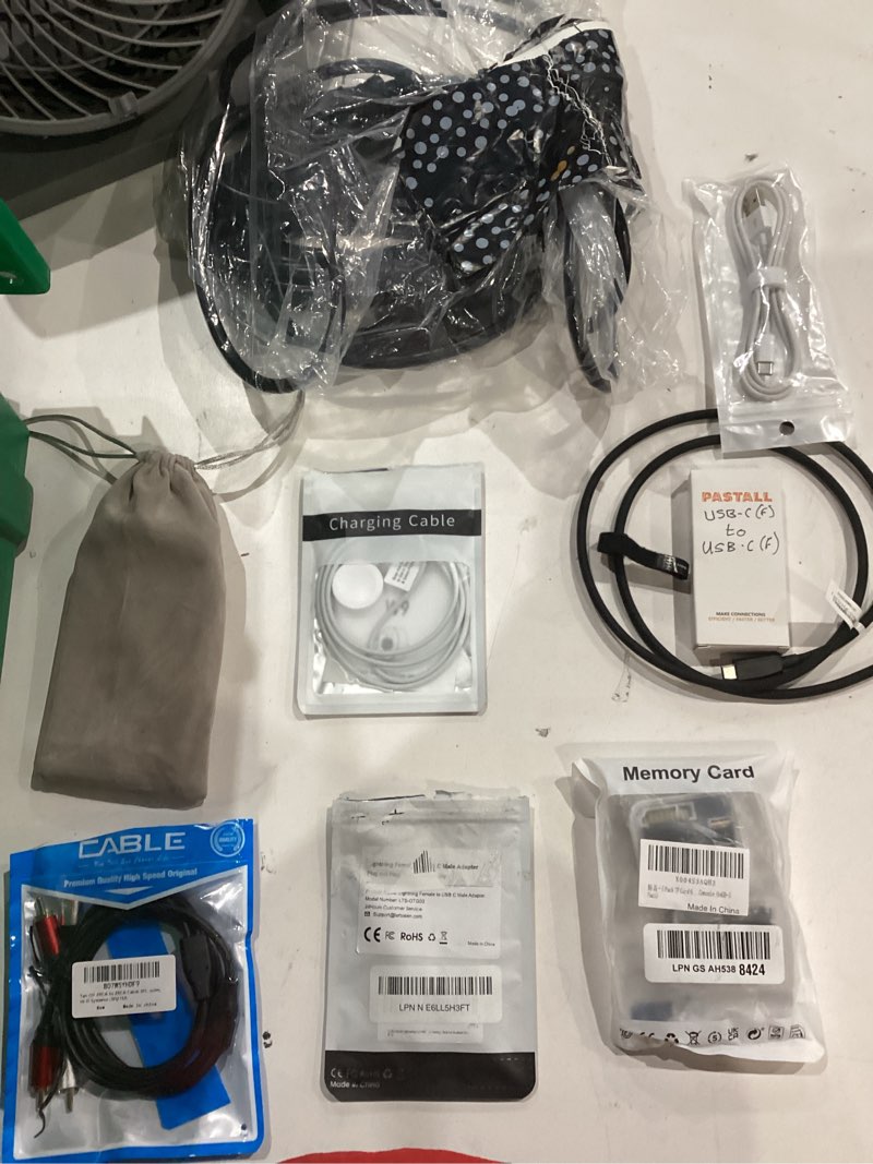 Condition photo showing As Is for assorted lot of electronics (headphones, small gadgets, headsets, etc.) 