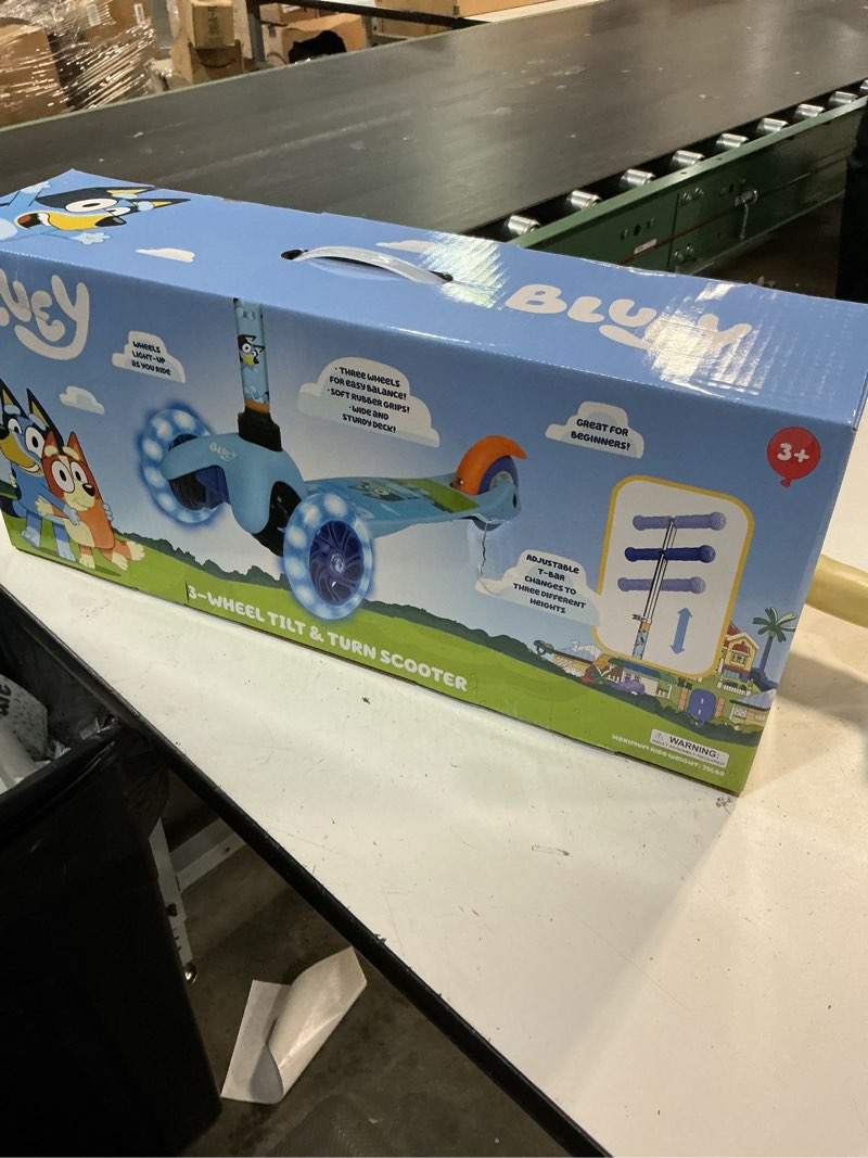 Condition photo showing New/Like New for self balancing kick scooter with light up wheels, extra wide deck, 3 wheel platform, foot activated brake, 75 lbs limit, kids & toddlers girls or boys, for ages 3 and up bluey