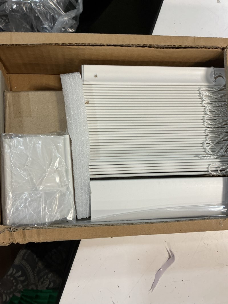 Condition photo showing New/Like New for basic collection pre-cut white cordless room darkening faux wood blind with 2 in. slats 37 in. w x 60 in. l