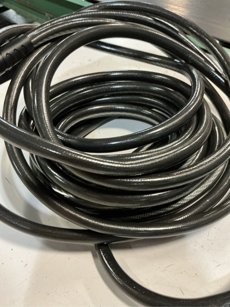 Condition photo showing As Is for neverkink teknor apex 5/8-in x 50-ft heavy kink free vinyl gray coiled hose
