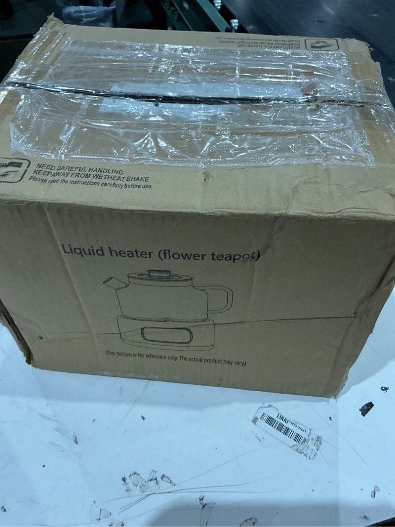 Condition photo showing As Is for liquid heater (flower teapot)