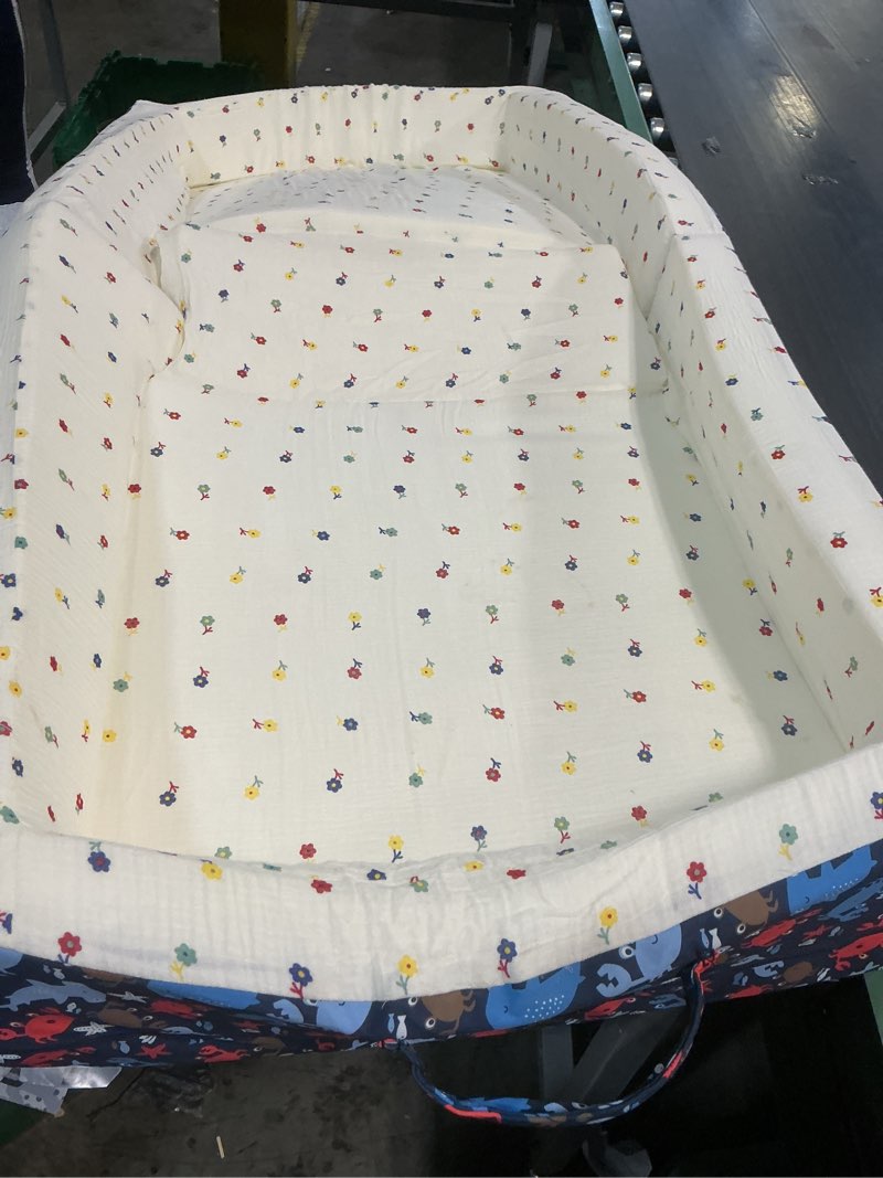 Condition photo showing As Is for 100% cotton lining portable foldable toddler travel bed - soft foam floor bed with washable cover, safe and comfortable toddler crib, ocean blue