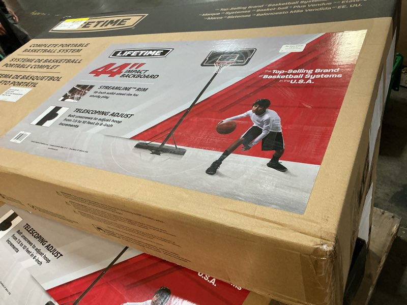 Condition photo showing New/Like New for lifetime 44” cross over portable basketball hoop