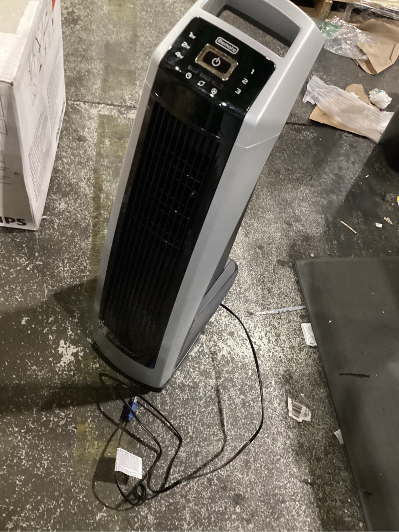 Condition photo showing As Is for lasko high velocity oscillating tower fan for bedroom, garage, basement, and gym with remote control, timer, 3 powerful speeds, 35" silver/black, u35115