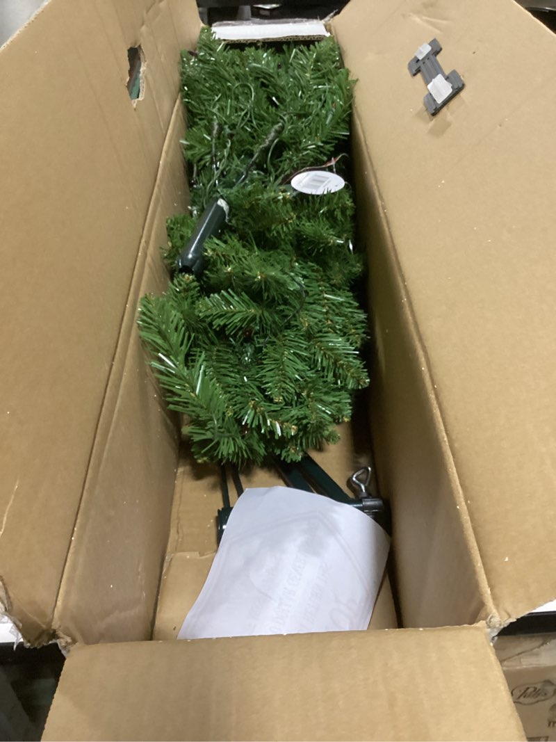 Condition photo showing Good Condition for National Tree Company 4.5 ft Pre-Lit Kingswood Fir Slim Artificial Christmas Tree, 150 Multicolor Lights, 330 Tips, Includes Stand, Green 4.5 Feet Christmas Tree