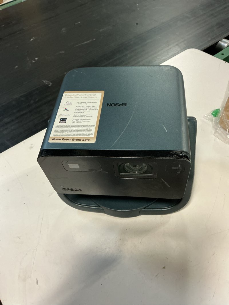 Condition photo showing As Is for epson epiqvision mini ef22 full hd 1080p portable smart laser projector | 3-chip 3lcd 1000 lumens color and white brightness hdr google tv swivel stand built-in speakers home theater outdoor movies