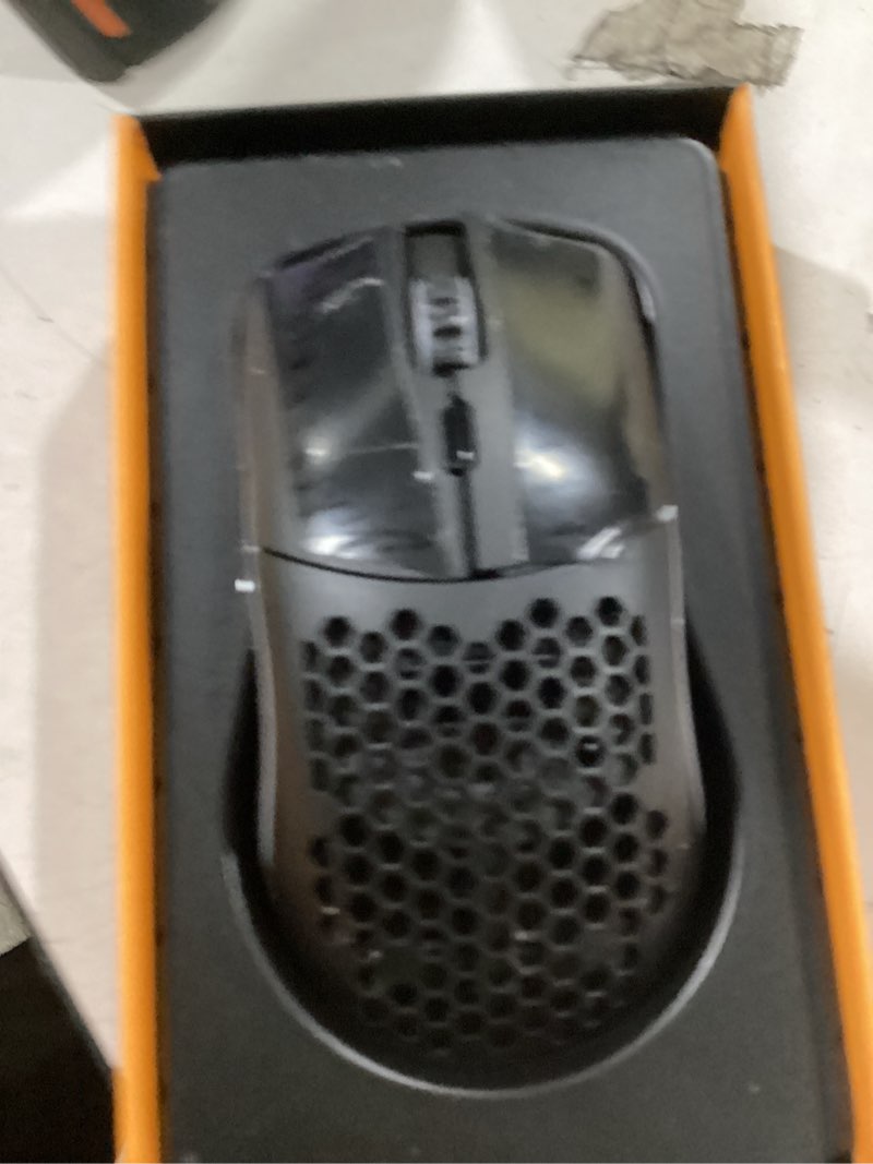 Condition photo showing As Is for GLORIOUS Model O Wireless Gaming Mouse - Superlight, 69g Honeycomb Design, RGB, Ambidextrous, Lag Free 2.4GHz Wireless, Up to 71 Hours Battery - Matte Black Black Model O (Ambidextrous)