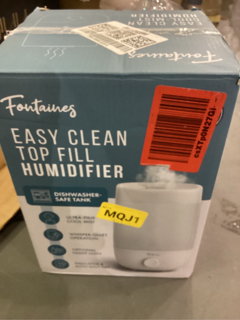 Condition photo showing New/Like New for Top fill humidifier