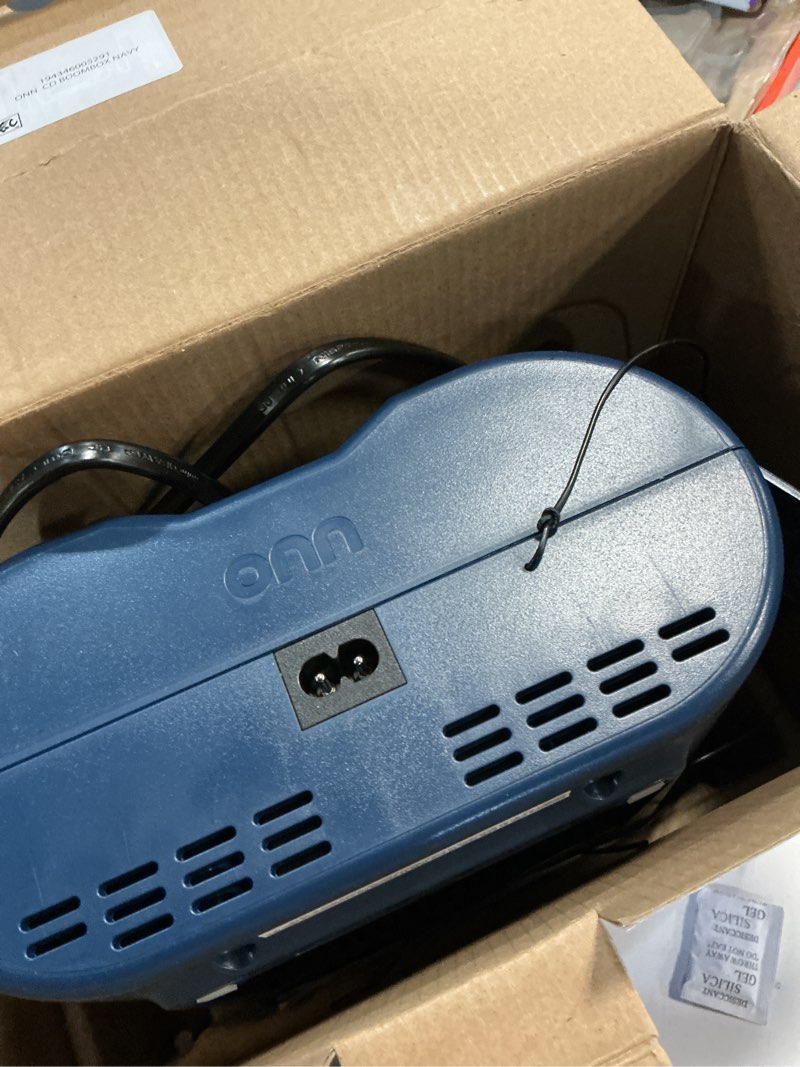 Condition photo showing As Is for onn. portable cd boombox with digital fm radio  navy