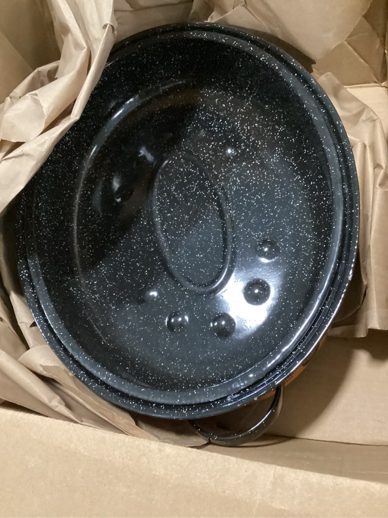 Condition photo showing Good Condition for Granite Ware 19 inch oval roaster with Lid design to accommodate up to 20 lb poultry/roast. Resists up to 932°F