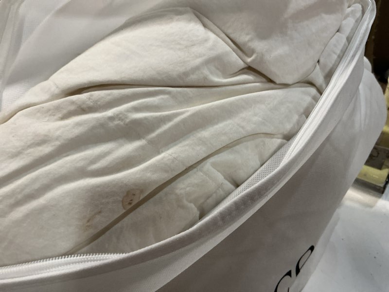 Condition photo showing As Is for lightweight premium down comforter, king/cal king, down