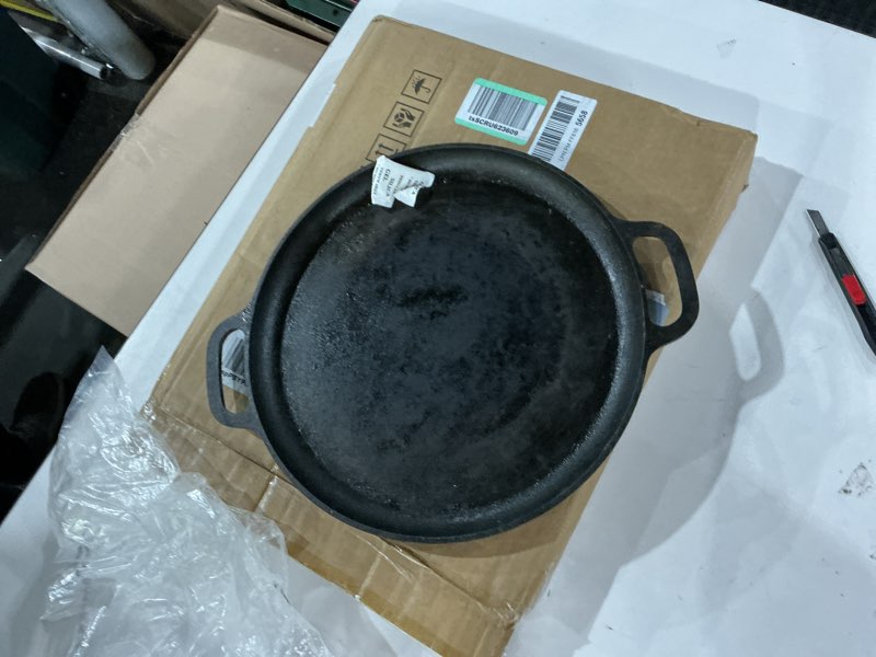 Condition photo showing As Is for Cast Iron Pizza Pan - 14-Inch Baking Pan for Oven, Stovetop, Grill, or Campfires - Durable, Even-Heating, Versatile Cast Iron Griddle by Home-Complete 14" Pizza Pan