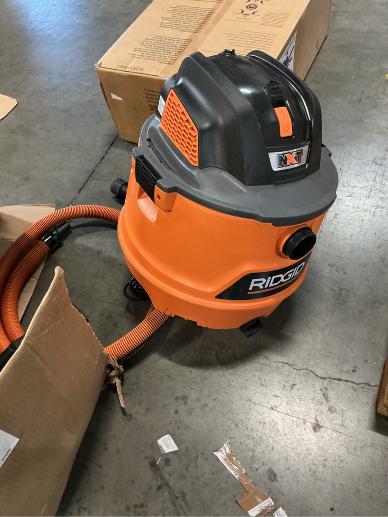Condition photo showing As Is for 14 gal. 6.0 peak hp nxt shop vacuum wet dry vac with fine dust filter, locking hose, wands and attachments hd1400