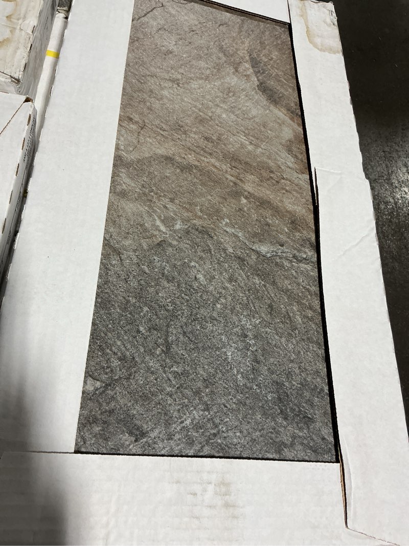 Condition photo showing As Is for 16 boxes  63be78 belmont multicolor 12-in x 24-in glazed porcelain stone look floor tile (15.54 sf/bx)
