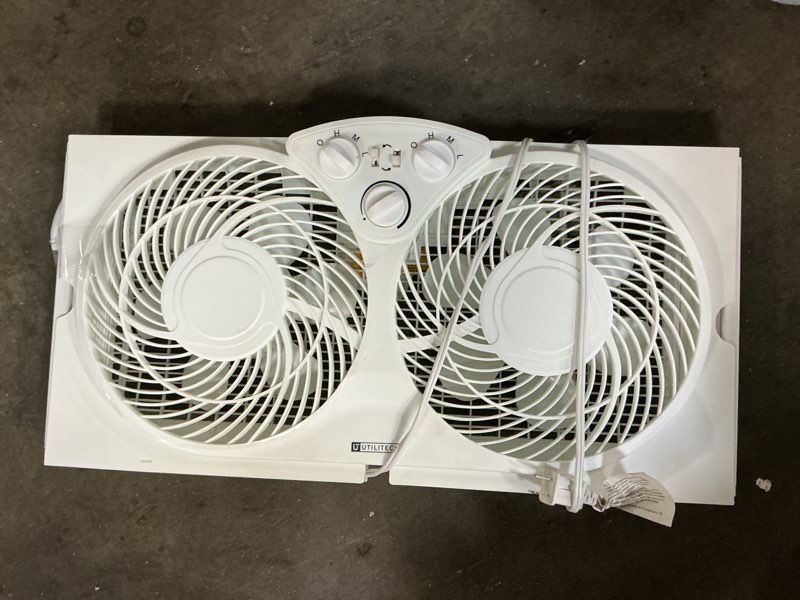 Condition photo showing As Is for utilitech 9-in indoor window fan, in white