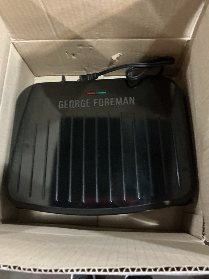 Condition photo showing New/Like New for george foreman family-size grill & panini press, nonstick ceramic coating, fat-removing slope, adjustable angle, indoor/outdoor use 5-serving