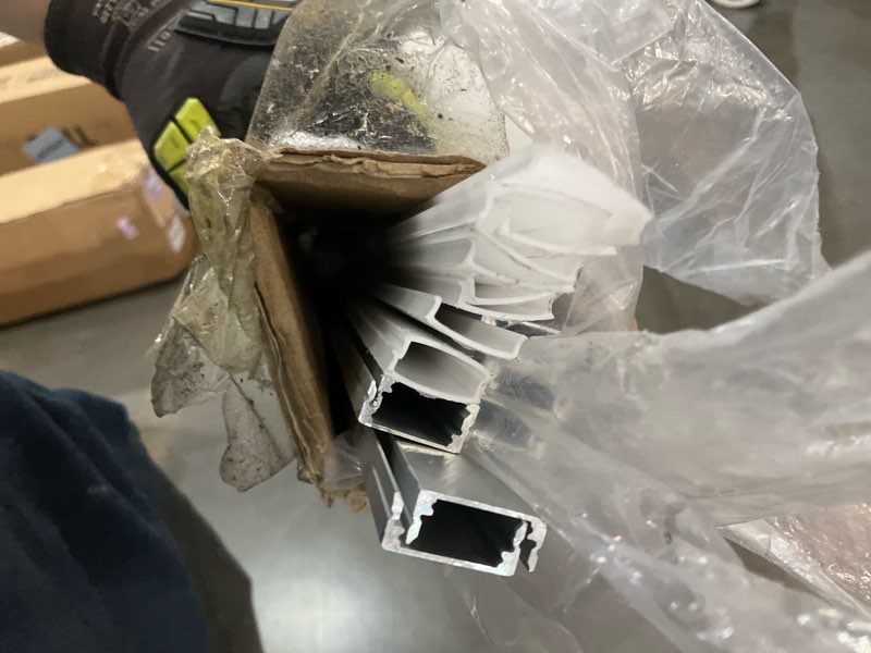 Condition photo showing As Is for hunhun 10-pack 6.6ft/ 2meter u shape led aluminum channel system with milky cover, end caps and mounting clips, aluminum profile for led strip light installations, very easy installation