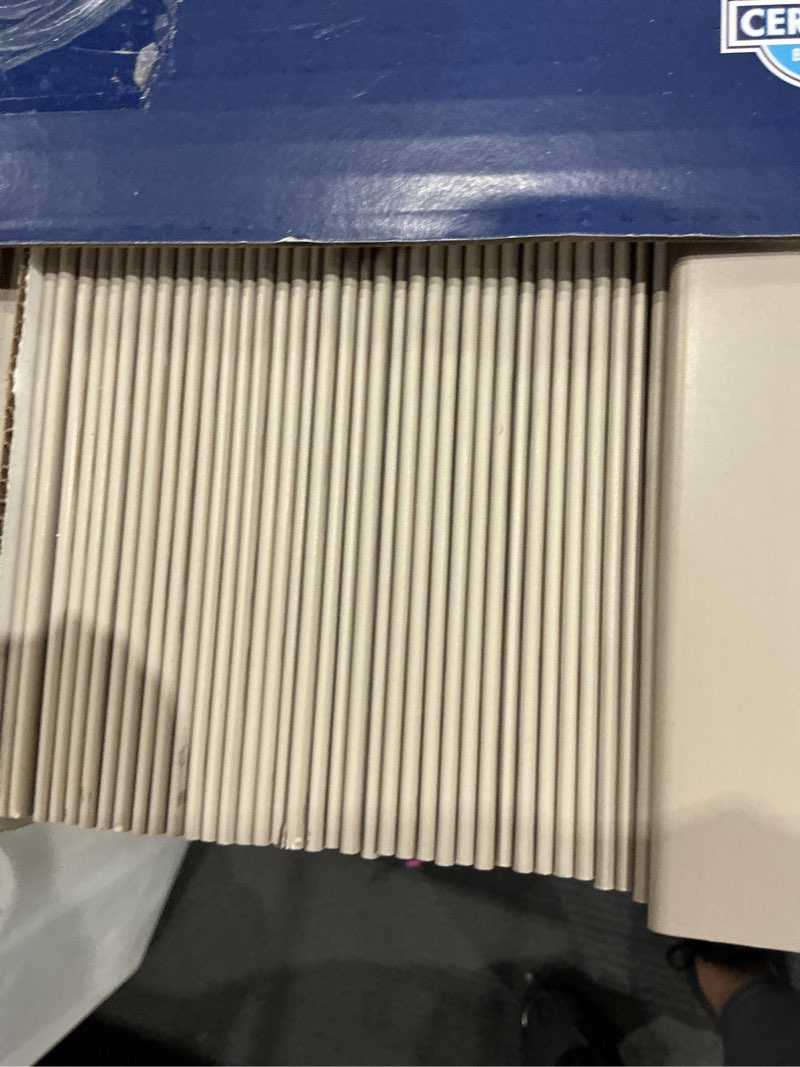 Condition photo showing As Is for levolor trim+go 2-in slat width 23-in x 64-in cordless greige faux wood room darkening horizontal blinds
