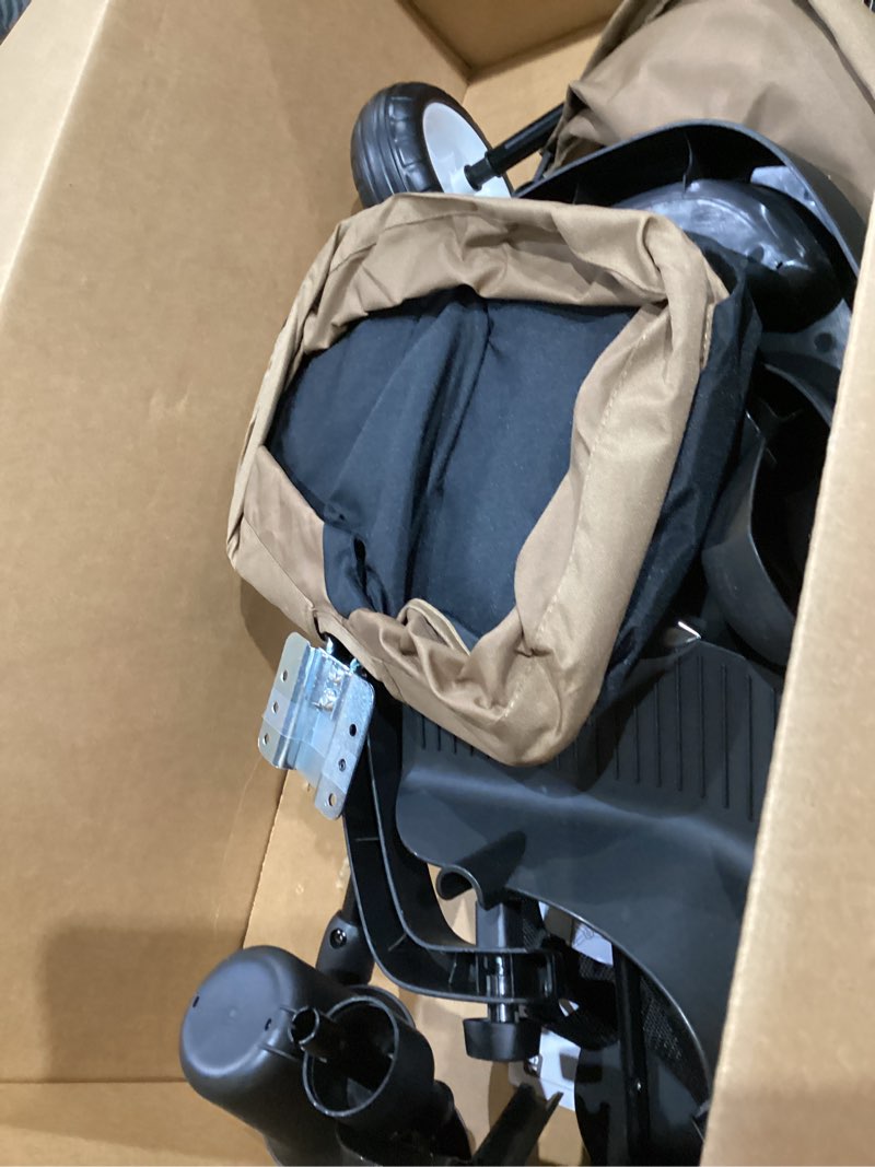 Condition photo showing As Is for radio flyer city 4-in-1 stroll 'n trike, mocha, for riders 1-5 years old, 4 riding modes, 3 point harness with comfort pad, parent controlled steering, rear storage, stroller tricycle for toddlers