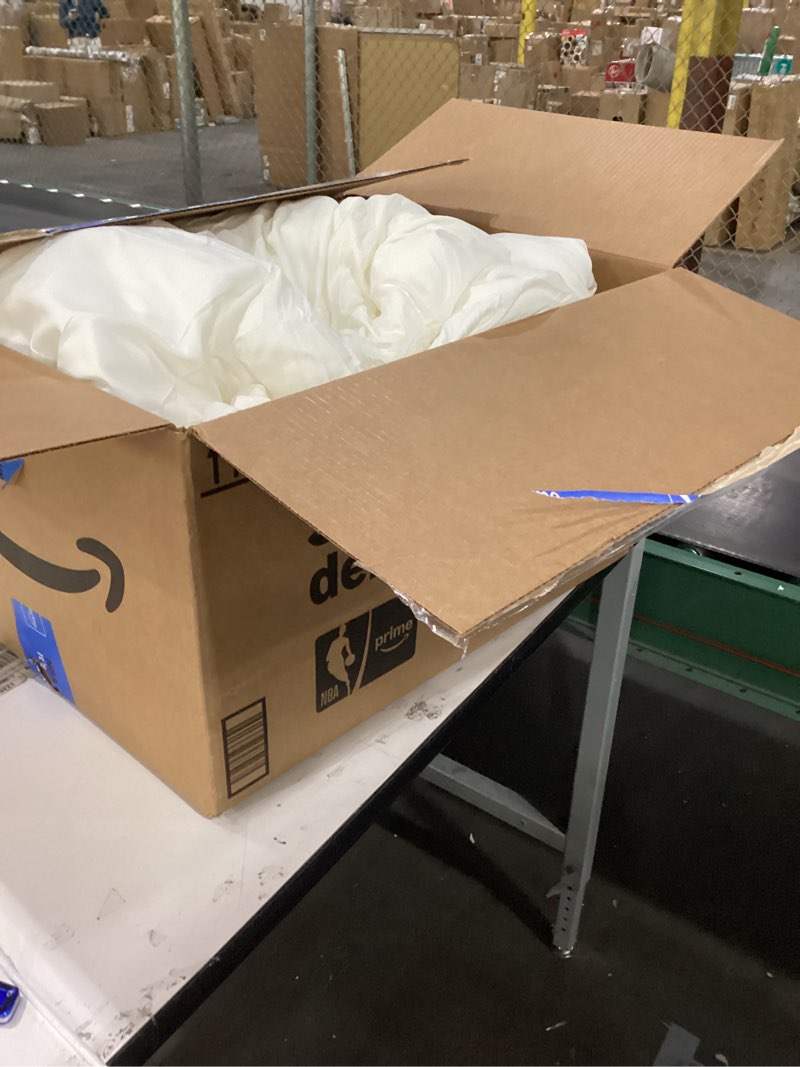 Condition photo showing As Is for Fluffy white comforter