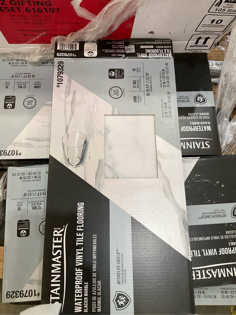 Condition photo showing As Is for stainmaster glacier calacatta marble white marble look 12-mil x 12-in w x 24-in l waterproof interlocking luxury vinyl tile flooring (19.79-sq ft/ carton)