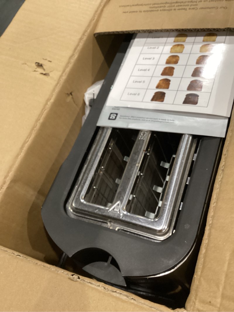 Condition photo showing As Is for Elite Gourmet ECT-3100 Long Slot 4 Slice Toaster, Reheat, 6 Toast Settings, Defrost, Cancel Functions, Built-in Warming Rack, Extra Wide Slots for Bagels & Waffles, Stainless Steel & Black 4 Slice Matte Black