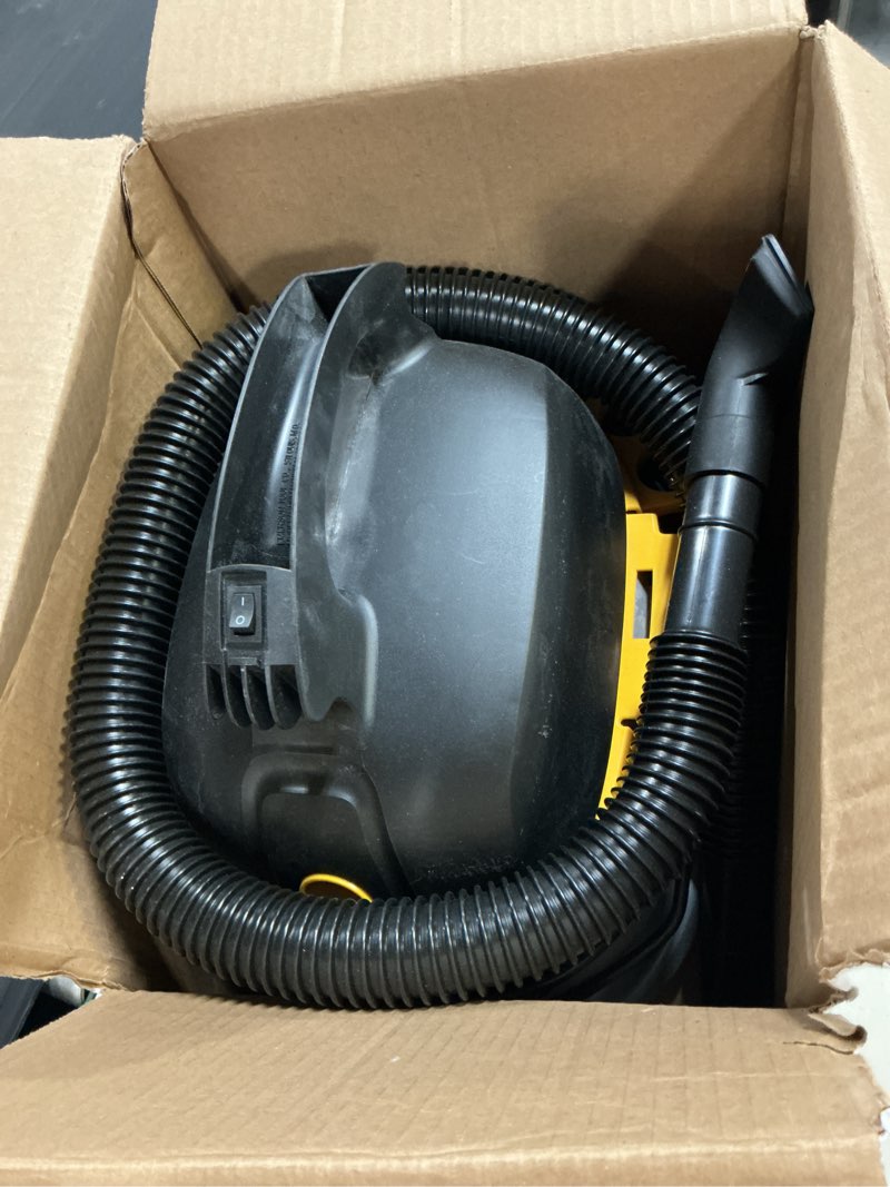 Condition photo showing As Is for 2.5 gal. 1.75-peak hp compact wet/dry shop vacuum with filter bag, hose and accessories