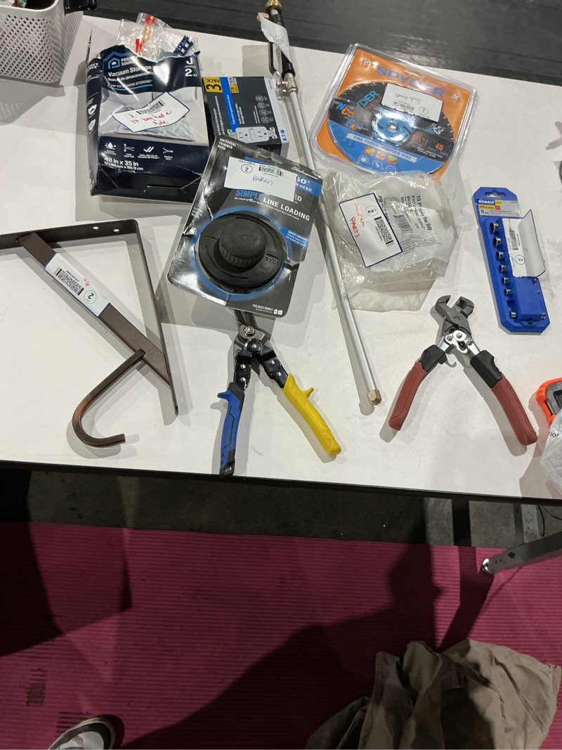 Condition photo showing As Is for assorted home improvement lot (small tools, screw, home accessories, etc.)