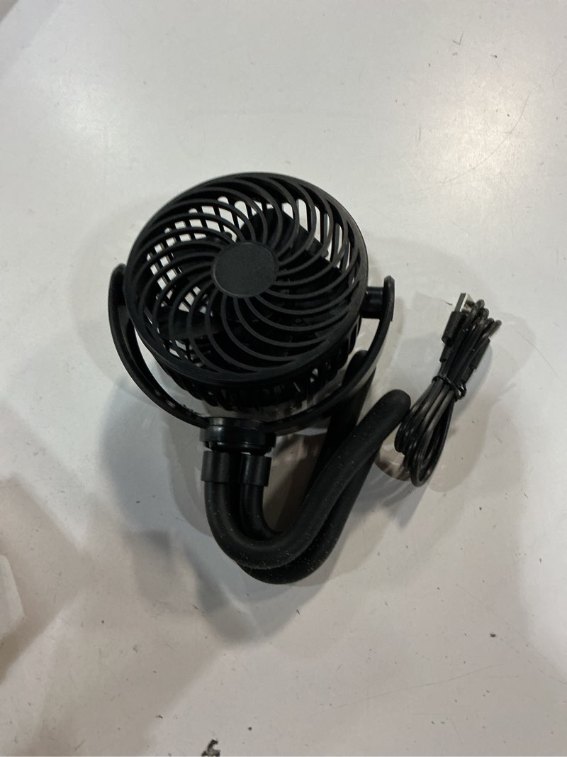 Condition photo showing As Is for mainstays 4" 3-speed portable rechargeable fan, flexible tripod and digital display, black, model#fn1005nbk