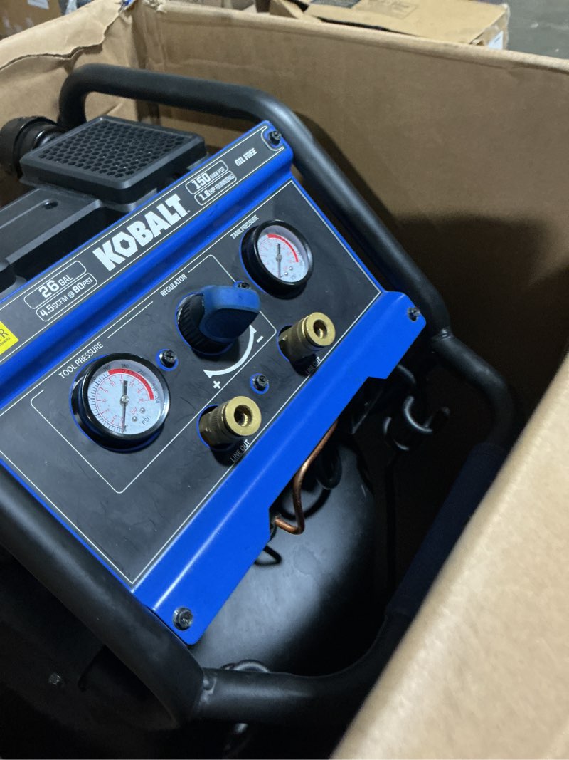 Condition photo showing As Is for kobalt quiet tech 26-gallon portable electric 150 psi vertical air compressor