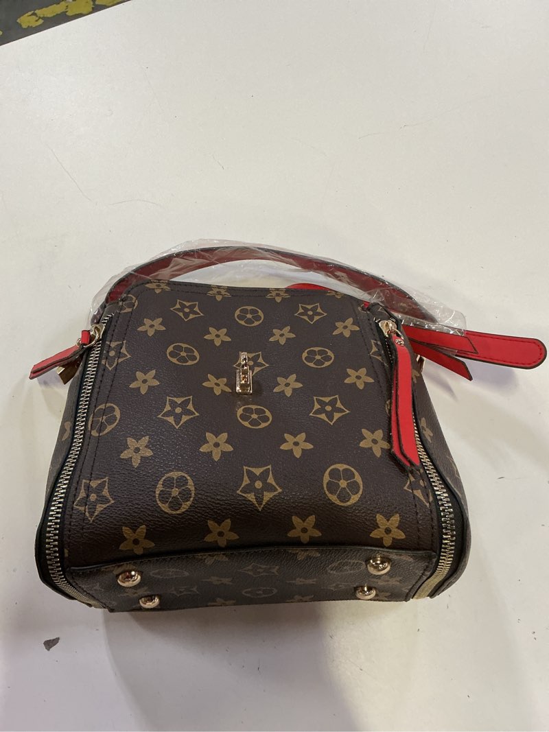 Condition photo showing New/Like New for brown printed sling bag for women crossbody bag with adjustable strap trendy casual handbag brown