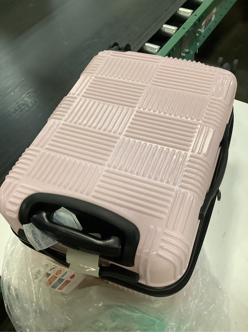 Condition photo showing New/Like New for american tourister nxt checkered hardside carry on spinner suitcase - pink