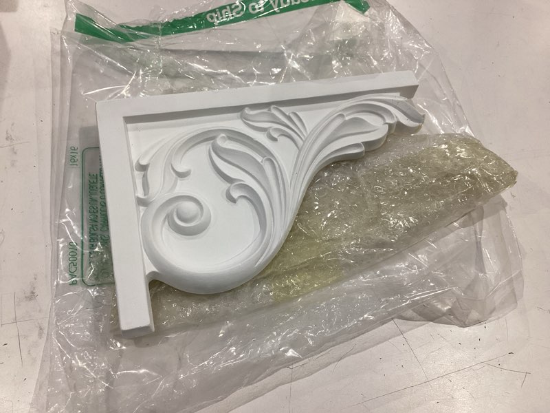 Condition photo showing Good Condition for ekena millwork sb11x07ac-r large acanthus, right stair brackets, 11 3/4"w x 7 3/4"h x 3/4"d, primed 1 count (pack of 1) right