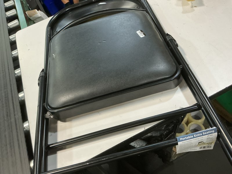 Condition photo showing As Is for peakform vinyl padded chair black