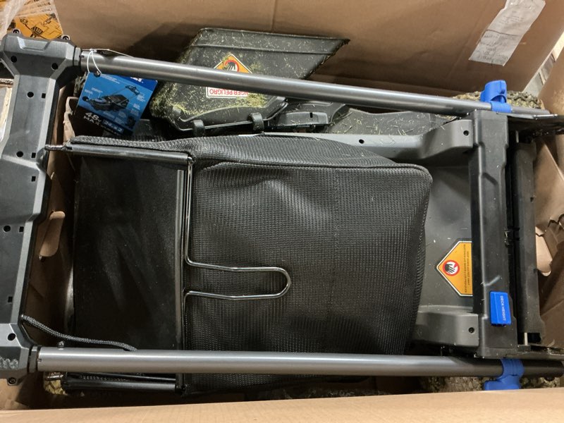 Condition photo showing As Is for kobalt 48v max (24vx2) 21-in self-propelled mower kit, (2) 6.0ah batteries and charger included