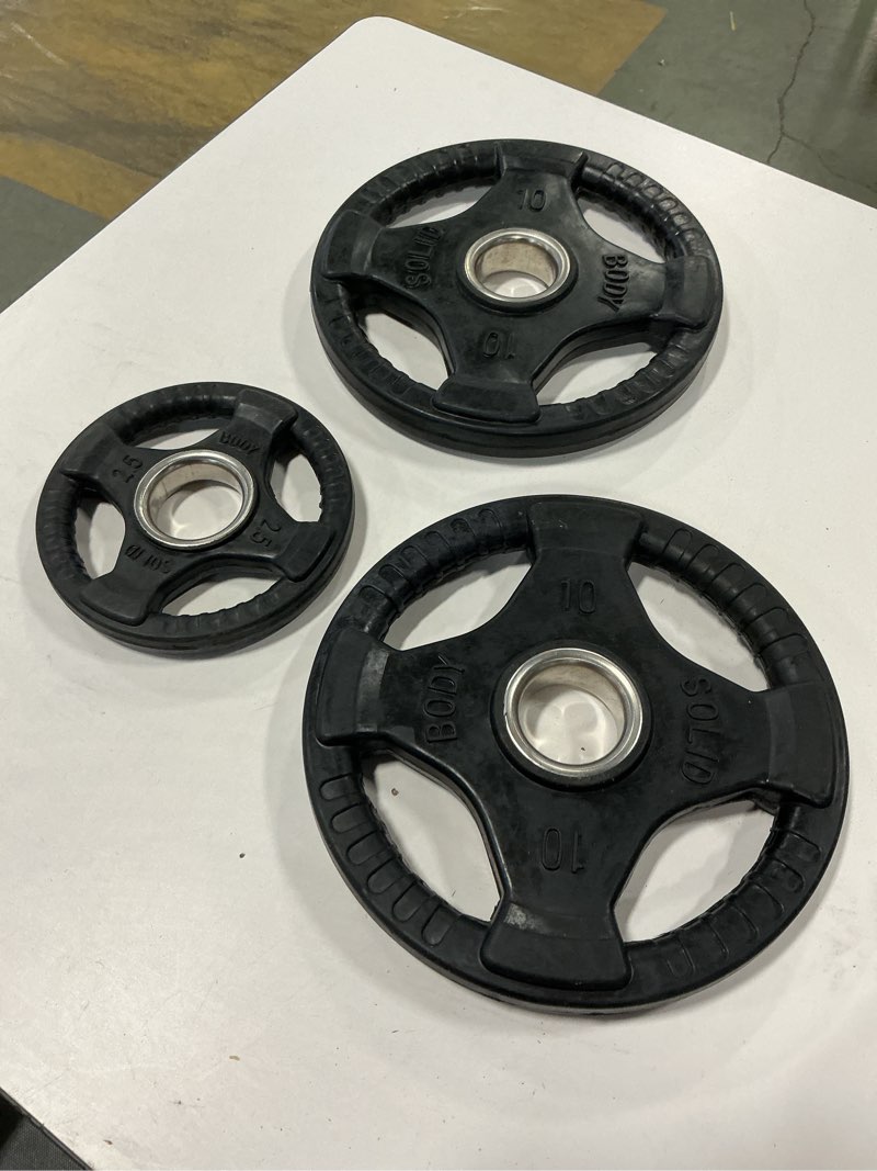 Condition photo showing Good Condition for body-solid-rubber-grip-olympic-plates (2 10lb plates and 1 2.5lb plate)