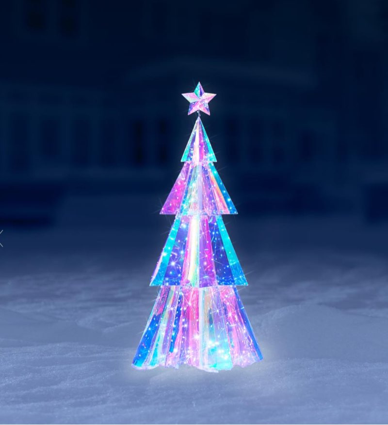 this is the nearly 6' tall illuminated Christmas tree that creates an enchanting holiday display. Embedded with 230 twinkling LEDs, the stunning Christmas tree illuminates from the inside and produces a prismatic light show with 10 lighting modes including flashing, fading, and music synchronization. Unlike lesser decor that only depicts rough outlines of animals or objects, this tree?s LEDs shimmer through its translucent PVC sheath. Its base and stakes allow for indoor or outdoor use. Includes remote control with timer and 16 metal yard stakes. AC plug. 71" H x 35" W x 30" D. (7 lbs.)