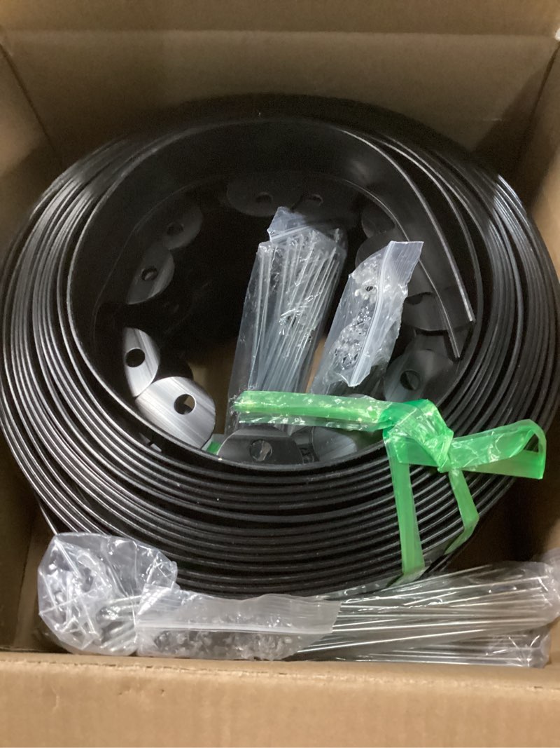 Condition photo showing Good Condition for landscape edging, 1.5" x 100' plastic garden edging with 120 pcs metal spikes, flexible garden border for lawn, landscaping, flower beds black 1.5in x 100ft