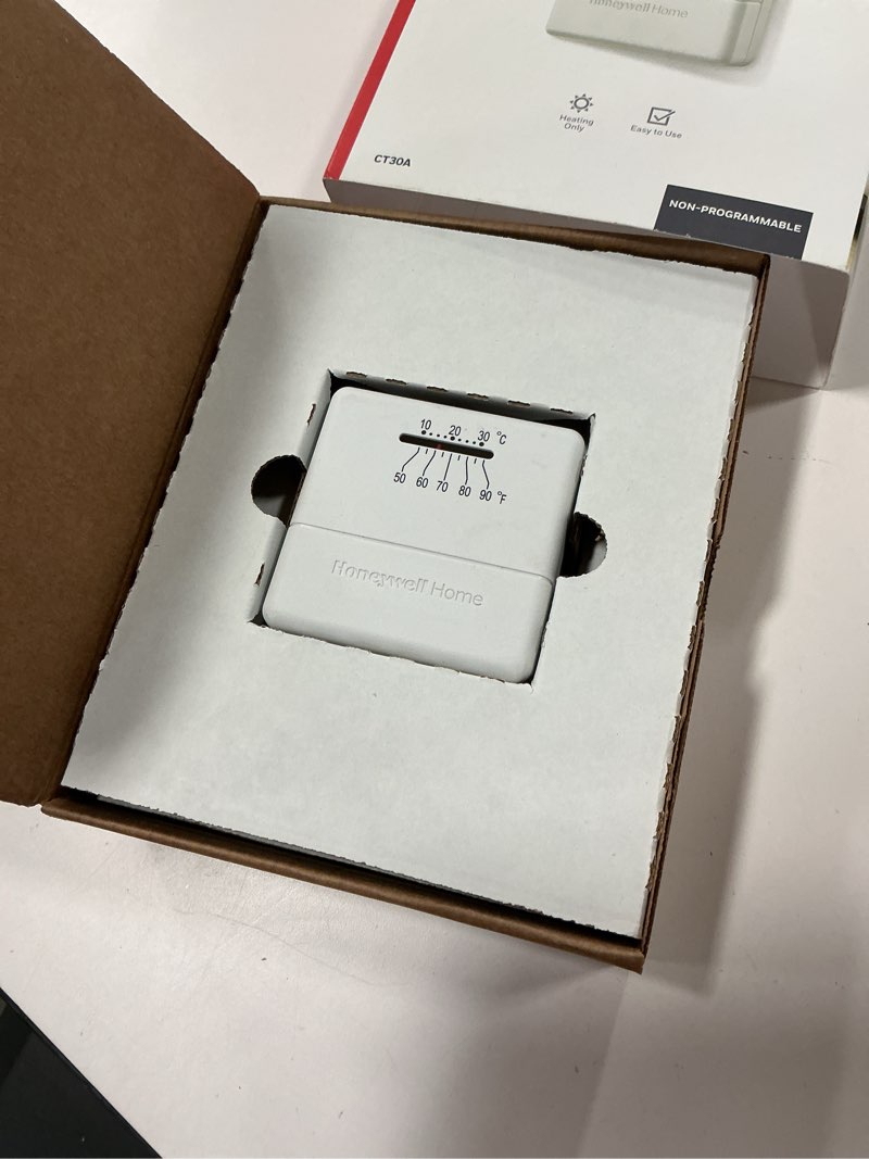 Condition photo showing As Is for Honeywell CT30A1005 Standard Manual Economy Thermostat, Almond, 0.6