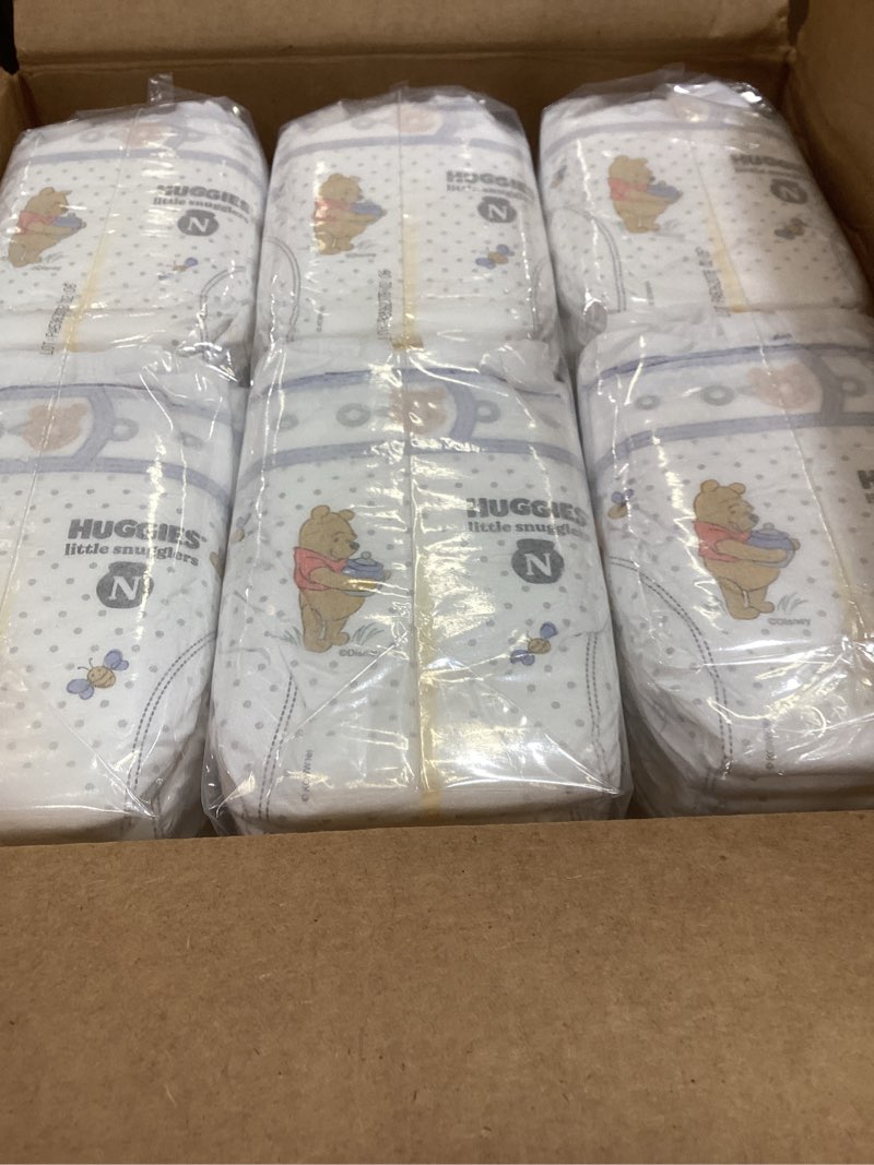 Condition photo showing Good Condition for huggies size newborn diapers, little snugglers baby diapers, size newborn (up to 10 lbs), 144 count, packaging may vary