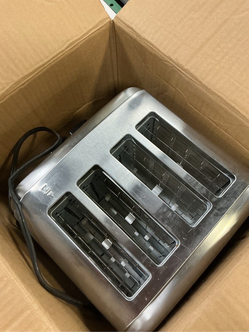 Condition photo showing As Is for cuisinart 4 slice toaster, compact stainless steel toaster with extra-wide slots for toasting bread, french toast, bagels and pastries, defrost & reheat functions, cpt-180p1, brushed stainless