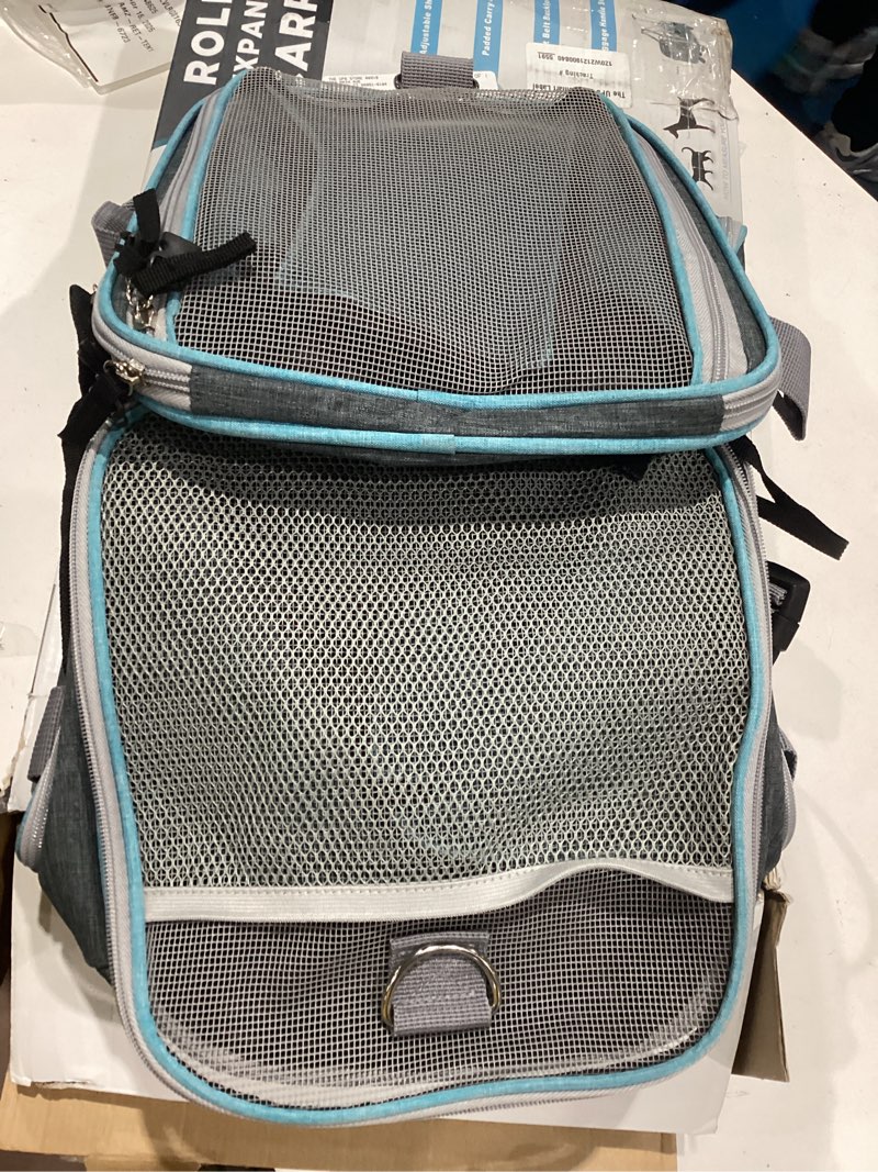 Condition photo showing Good Condition for xkiss pet rolling carrier,cat carrier,airline approved pet carrier for small dogs cats,3 sides expandable,foldable, multiple carrying options,breathable,self locking zippers,wheels rotate 360° (grey)