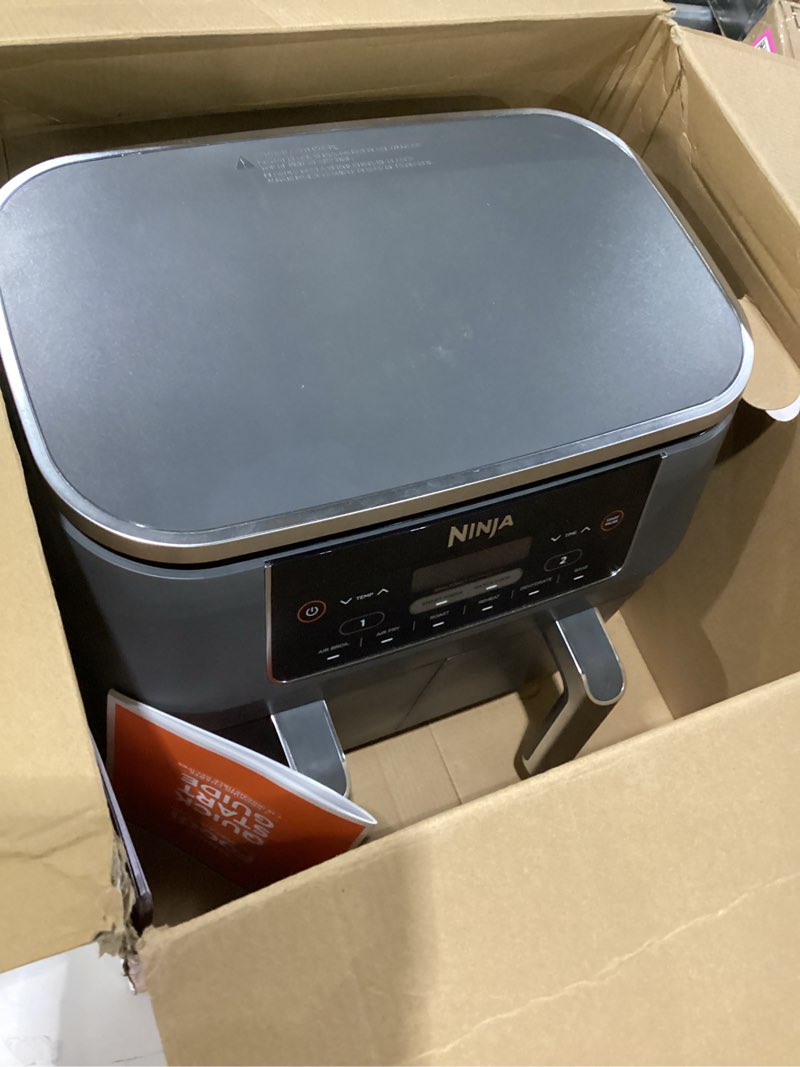 Condition photo showing As Is for Ninja DZ201 Foodi 8 Quart 6-in-1 DualZone 2-Basket Air Fryer with 2 Independent Frying Baskets, Match Cook & Smart Finish to Roast, Broil, Dehydrate & More for Quick, Easy Meals, Grey-NOT TESTED
