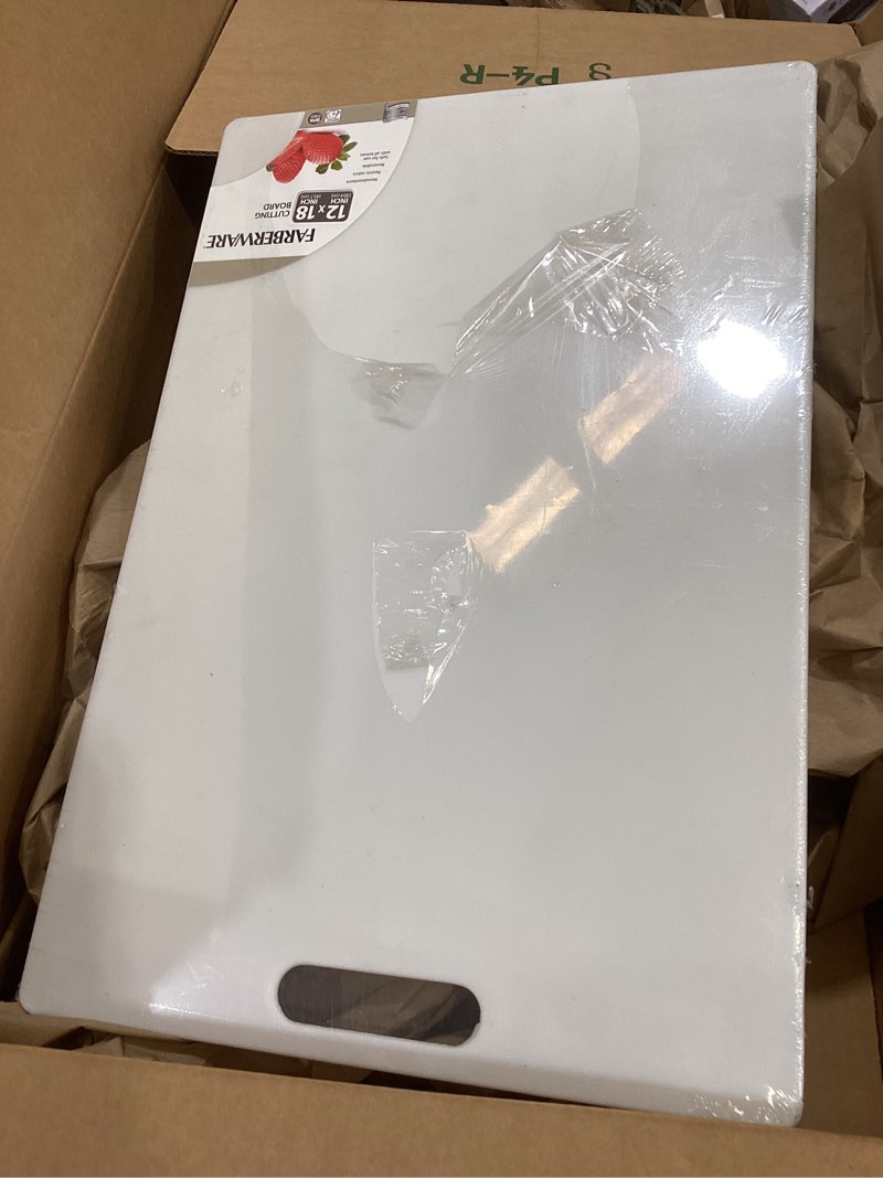 Condition photo showing Good Condition for Farberware Extra-Large Plastic Cutting Board, Dishwasher- Safe Poly Chopping Board for Kitchen Meal Prep with Easy Grip Handle, 12-inch by 18-inch, White 18"L x 12"W Cutting Board