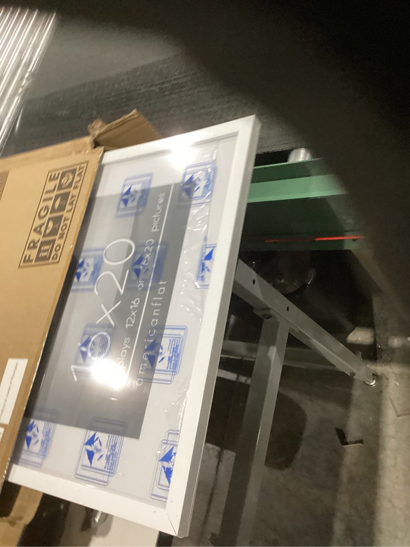 Condition photo showing Good Condition for americanflat 16x20 picture frame with polished plexiglass - use as 12x16 frame with mat or display 16x20 photo without mat - streamline collection - thin border picture frames for wall - white white 16x20 with 12x16 mat 1 pack